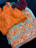 Beige Net  Saree with threadwork and orange Stitched Blouse