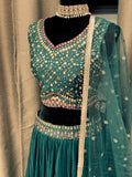 Party wear Lehenga in Bottle Green  Color