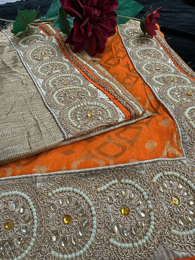 Orange Banarsi Saree finished with bead Lace