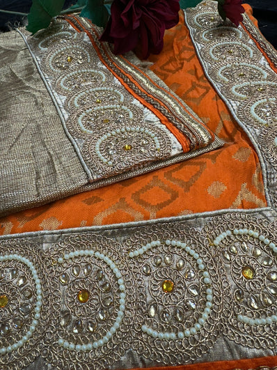 Orange Banarsi Saree finished with bead Lace