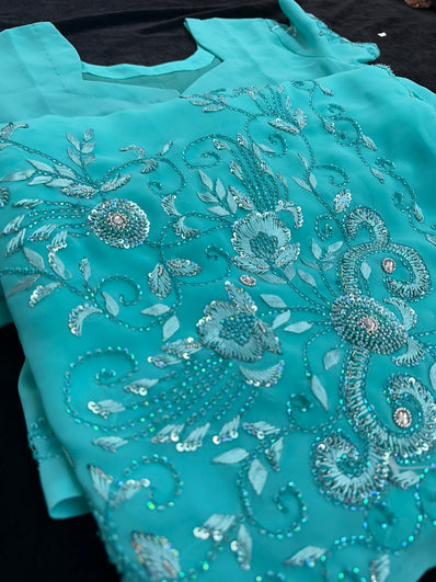 Turquoise Georgette Saree with Sequin and beadwork with Stitched Blouse