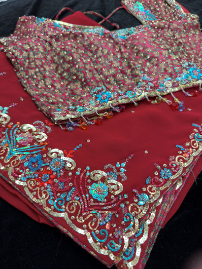 Maroon Georgette Saree with heavy Embroidery and Stitched Blouse