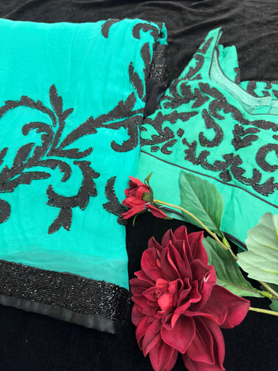 Teal Georgette Saree with heavy Embroidery and Stitched Blouse