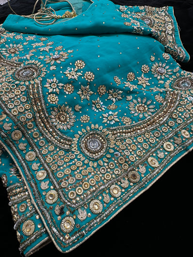 Dark Turquoise georgette Saree with heavy Embroidery and Stitched Blouse