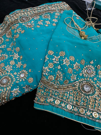 Dark Turquoise georgette Saree with heavy Embroidery and Stitched Blouse