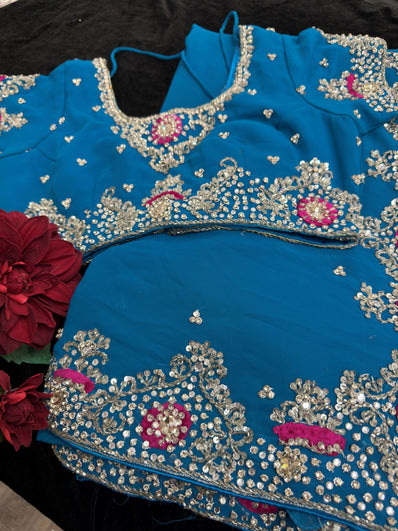 Blue georgette Saree with heavy Embroidery and Stitched Blouse