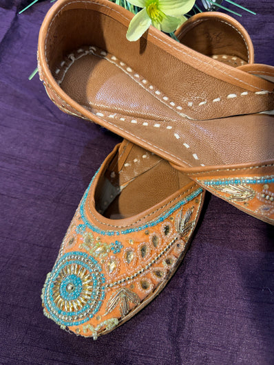 Turquoise & Gold Beaded Punjabi Jutti – Handcrafted Leather Ethnic Footwear with Embroidery & Pearl Detailing