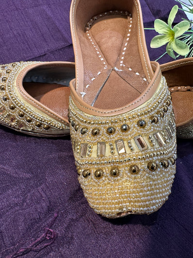 Gold Beaded Punjabi Jutti – Handcrafted Ethnic Footwear with Intricate Pearl & Mirror Embellishments for Weddings & Festive Wear