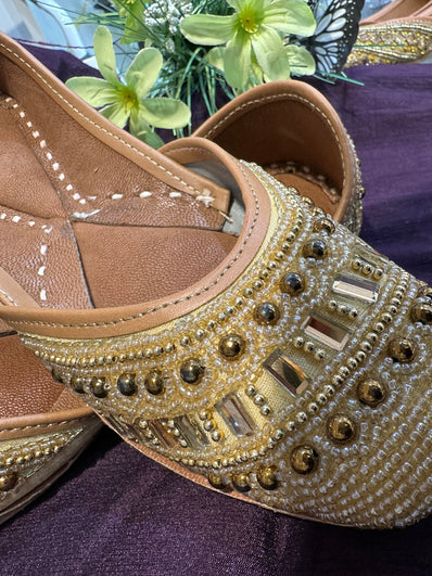Gold Beaded Punjabi Jutti – Handcrafted Ethnic Footwear with Intricate Pearl & Mirror Embellishments for Weddings & Festive Wear