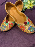 Gold Multicolor Phulkari Embroidered Punjabi Jutti – Handcrafted Ethnic Footwear with Mirror Work & Pom-Pom Detailing