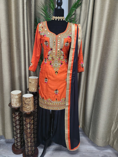Partywear Suit in Orange color with Black Salwar