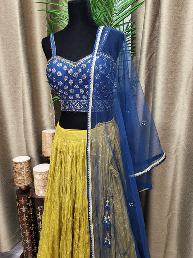 Party wear Lehenga in Blue and Mustard Yellow Color