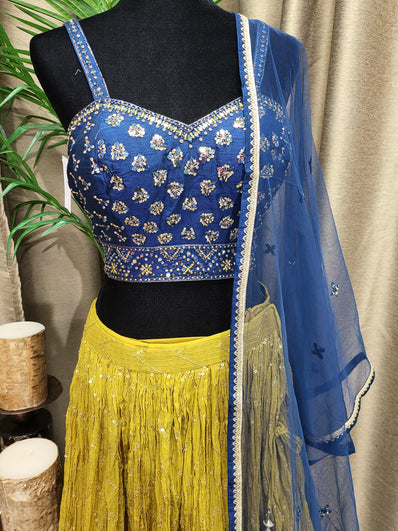 Party wear Lehenga in Blue and Mustard Yellow Color